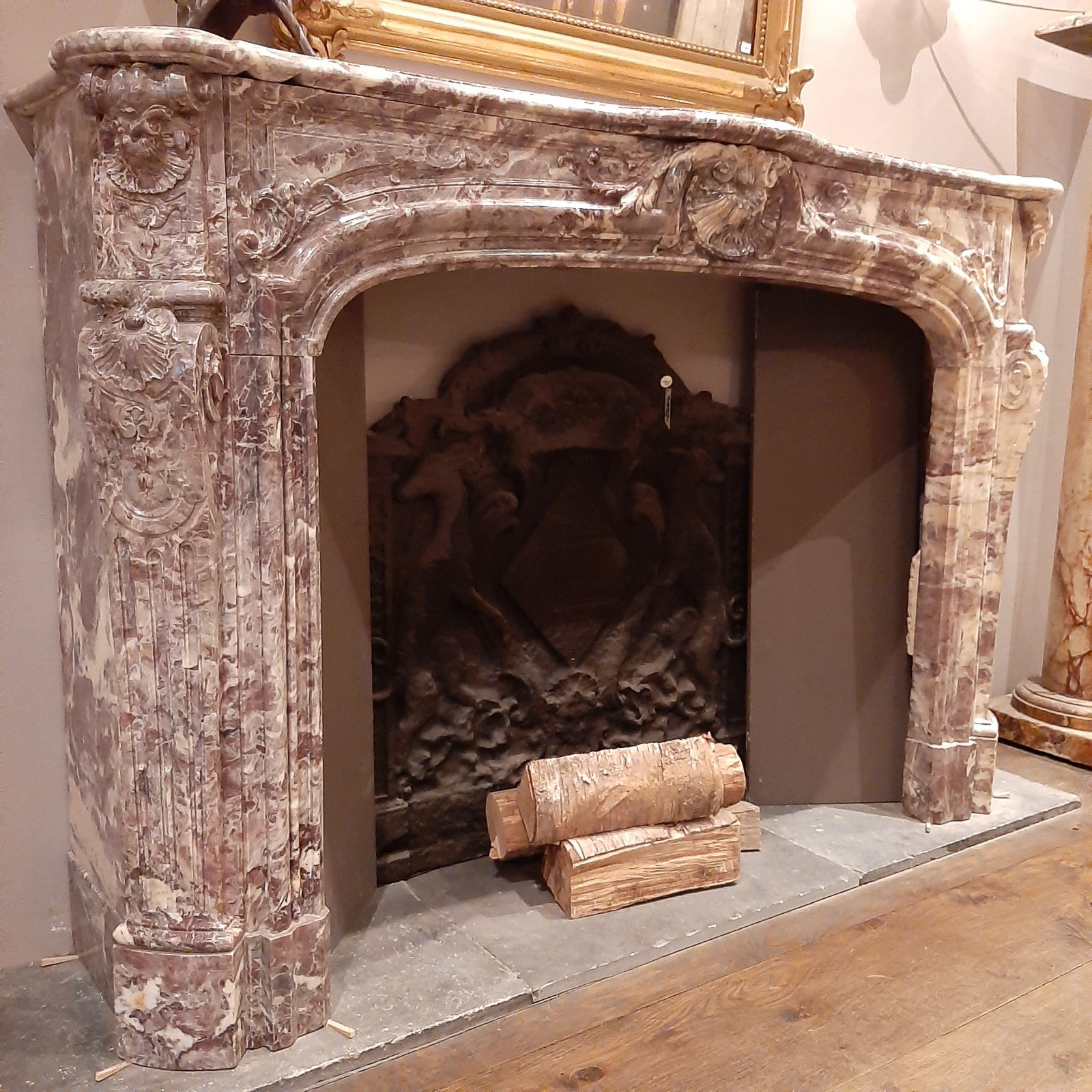 Antique marble fireplace with soft pink and creme tones Piet Jonker