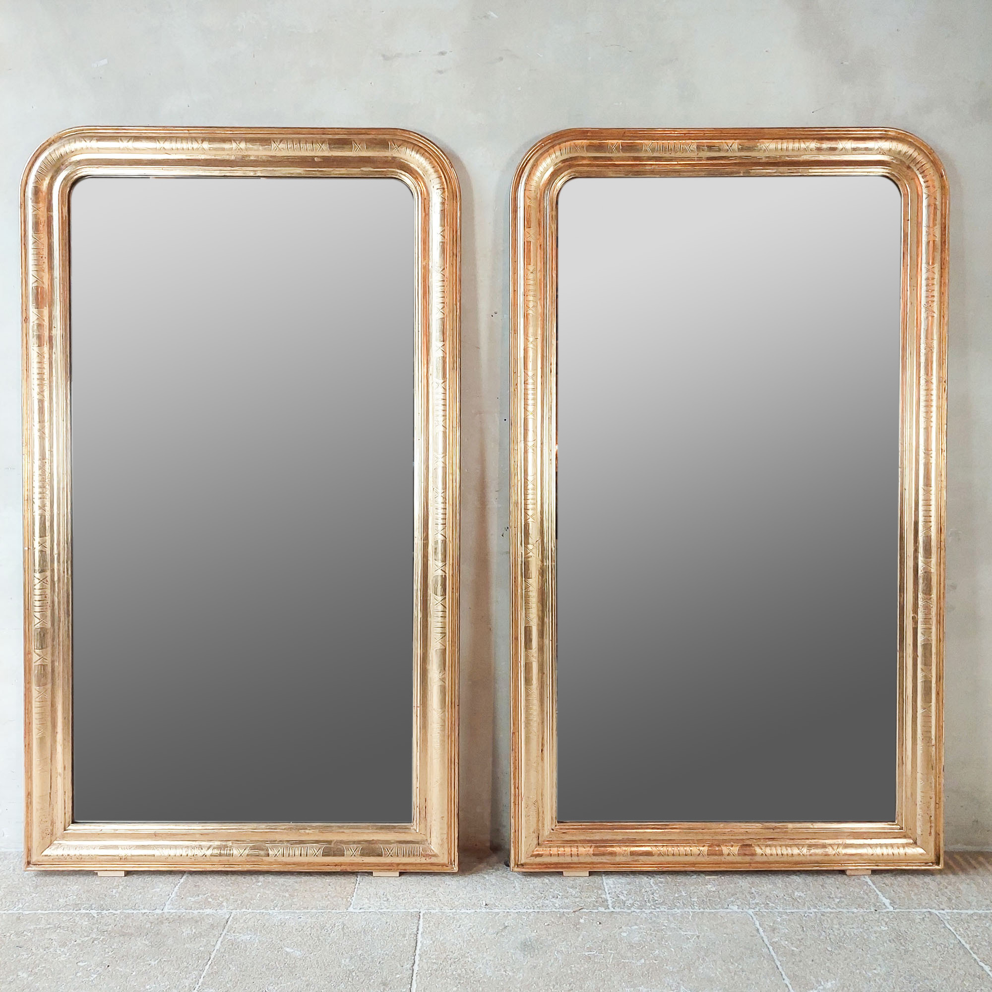 Pair of large antique goldplated mirrors Piet Jonker