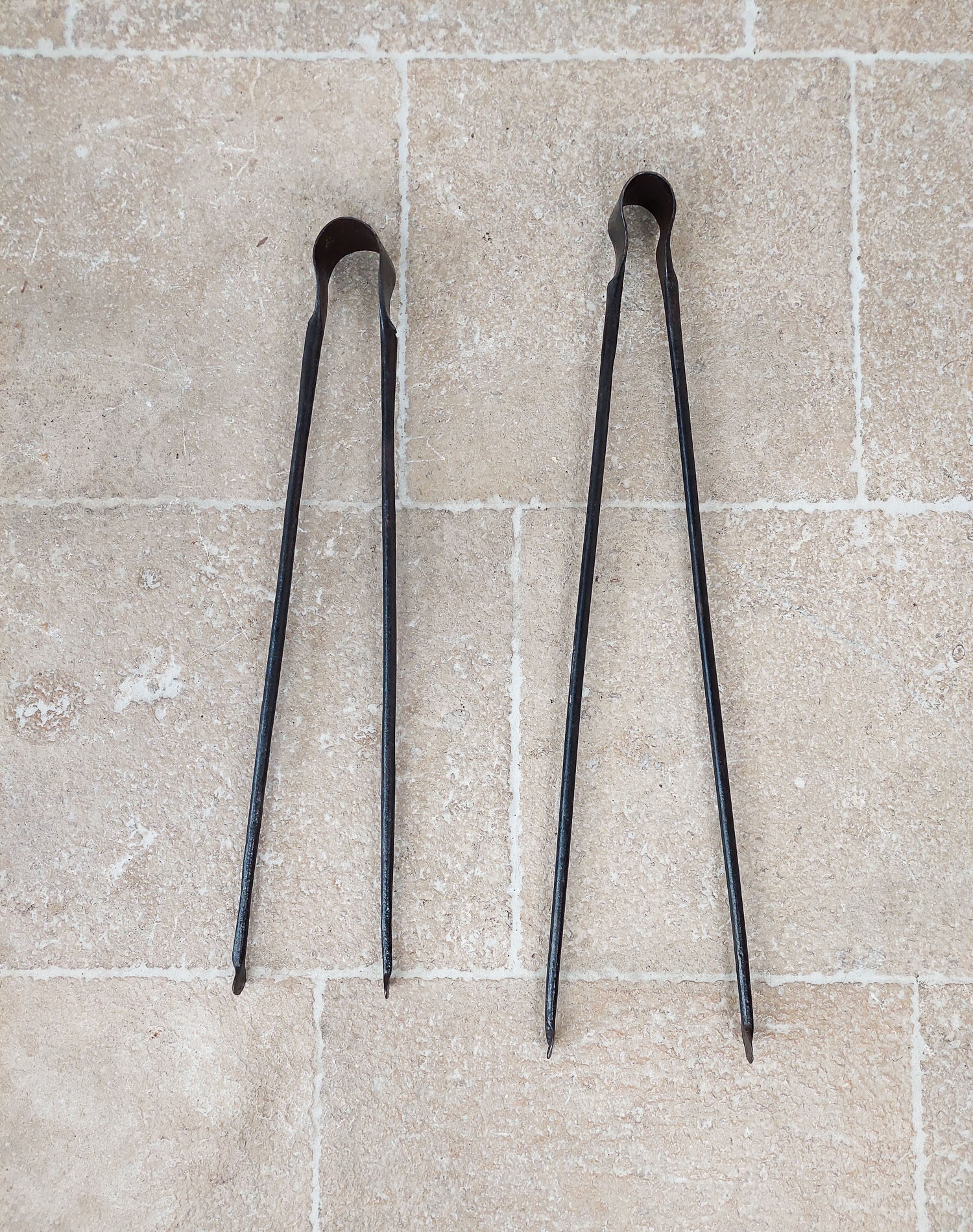 Old wrought iron fireplace tongs Piet Jonker